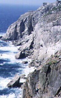 Climber on Formula ONE, Landing Craft Bay area, with Flying Buttress and the Battery in the background